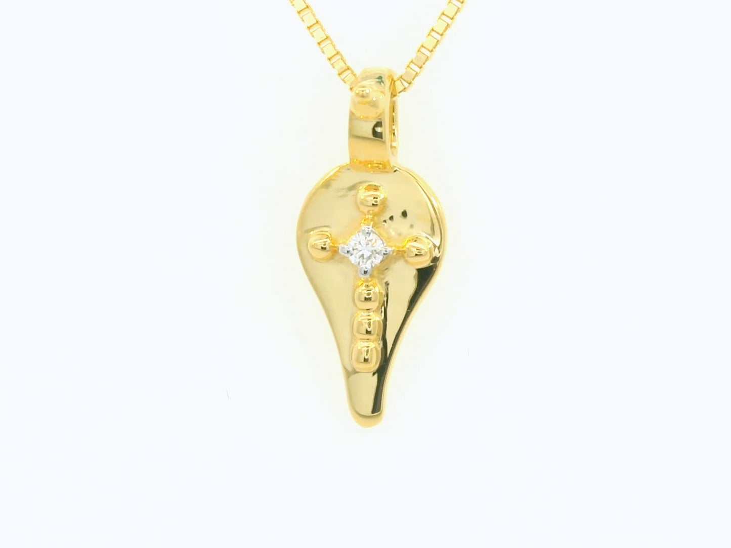 Elegant Gold Pendant with Diamond Accent